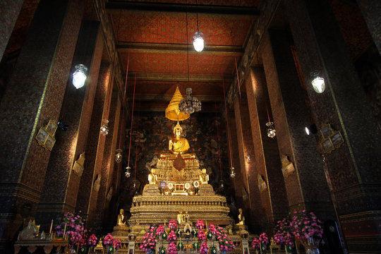 Buddha statue in Phra Ubosot, ordination hall in Wat Pho temple complex, Bangkok, Thailand