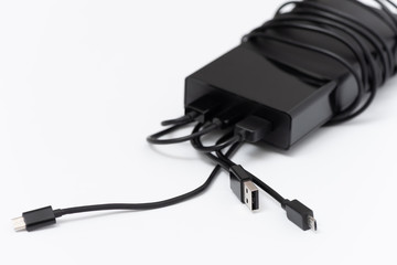 The power bank with charging cables.