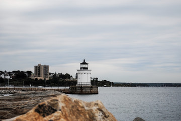 Fototapeta na wymiar Beautiful panorama of coast of Atlantic Ocean and lighthouse