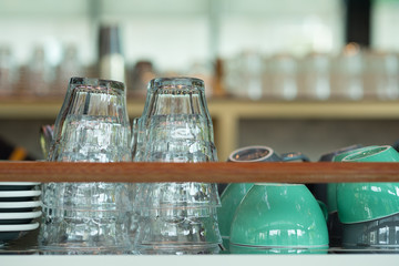 Stack of transparent glass coffee or tea cups