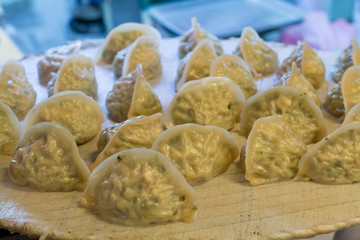 several fresh homemade asian dumplings