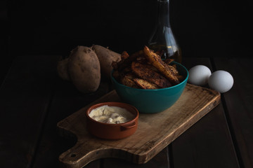 french fries with mayonnaise front view dark food papas fritas con mayonesa vista de frente