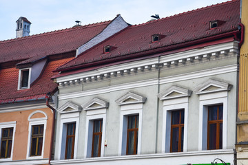 Typical romanian House with tiled roof. Brasov, Romania.