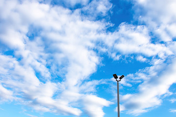 Fototapeta na wymiar Street lamps with bright blue sky.