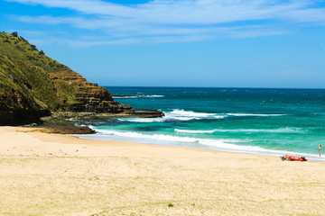 Little Garie Beach with blue waves and white beach on a clear summer day in Royal National Park near Sydney (Sydney, NSW, Australia)