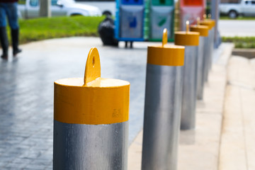 Stainless steel bollard barriers in front a shop prevent people for security. 