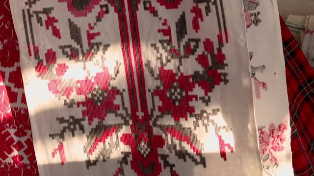 Antique towel in red and black colors. Traditional red and black cross-stitch. Belarusian folk embroidery, three colors - white, red and black