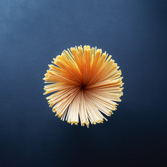 Italian spaghetti on a wooden table.Spaghetti on dark background with copy space