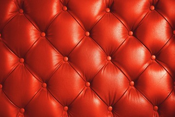 Living coral tone, pink orange color leather sofa pattern texture background, luxury background concept