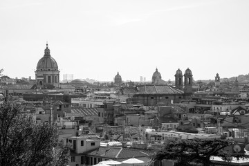 Black and white image rooftop view cityscape of Rome, Italy.