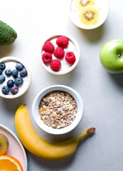Healthy breakfast. Fresh raspberries and blueberries with yogurt and muesli.