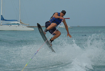 Guy Wakeboarding Off of the Tropical Ocean Waters in Aruba