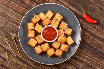 Tapioca squares and pepper jelly