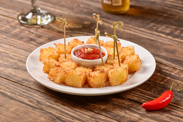 Tapioca squares and pepper jelly