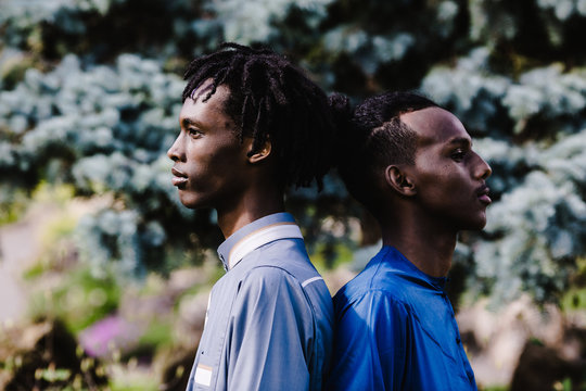 Young men standing outdoors