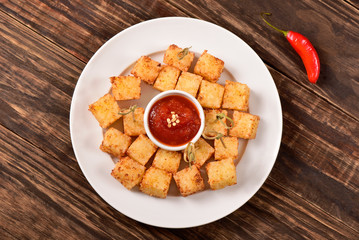 Tapioca squares and pepper jelly