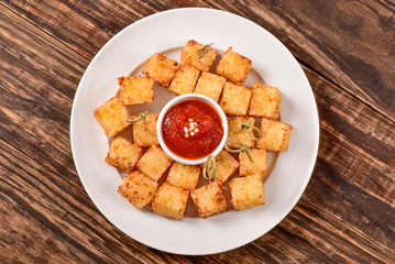 Tapioca squares and pepper jelly