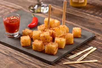 Tapioca squares and pepper jelly
