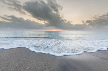 Fototapeta na wymiar Wave on beach of southern Thailand.