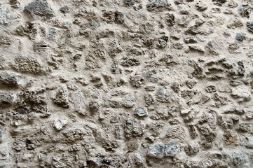 Old grey stone wall background texture