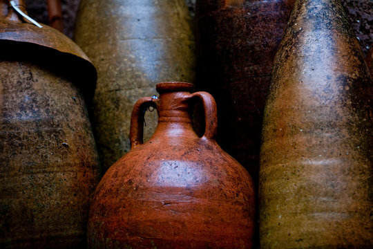 Pompeii, Italy: Ancient jugs dating back to 8 BC stand idle along the walls of Pompeii.