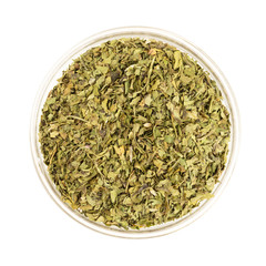 Bowl of Dried Cilantro Leaves Isolated