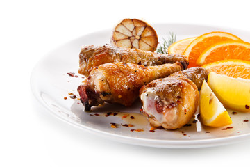 Drumsticks with garlic and fruit