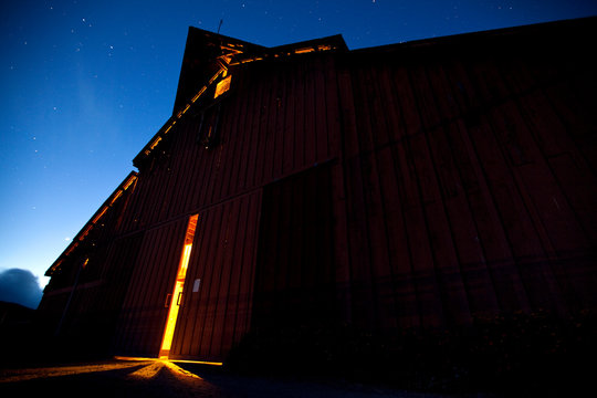 ARROYO GRANDE: A nighttime view of a barn lite from the inside.