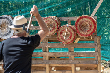 A man is ready for throwing axe on competition.