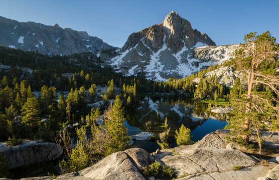 Mt. Thompson reflected in Baboon Lakes in the high sierra along the Blue Lake trail from Lake Sabrina CA.