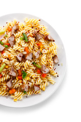Pasta with beacon and colorful vegetables
