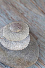 Fototapeta na wymiar zen style still life with balanced pebble