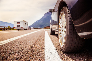 Tyre of a car on the emergency lane, breakdown on the highway. Copy space. 