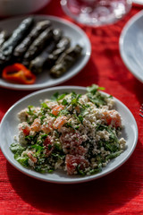 Salad with cottage cheese, tomatoes and parsley