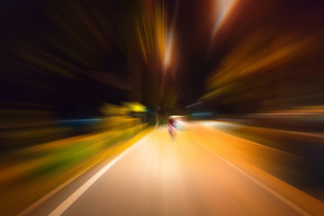 Night traffic with futuristic motion blur & zoom effects.
