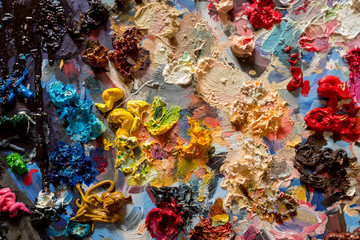 Closeup oil paints on wooden palette
