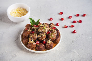 Кibbeh bil sanieh, Arabic meatballs. Top view.
