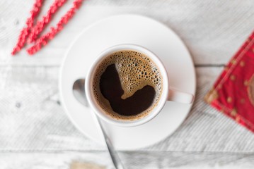 Coffee on white wooden table. 