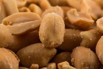 large amount of peeled salted peanuts
