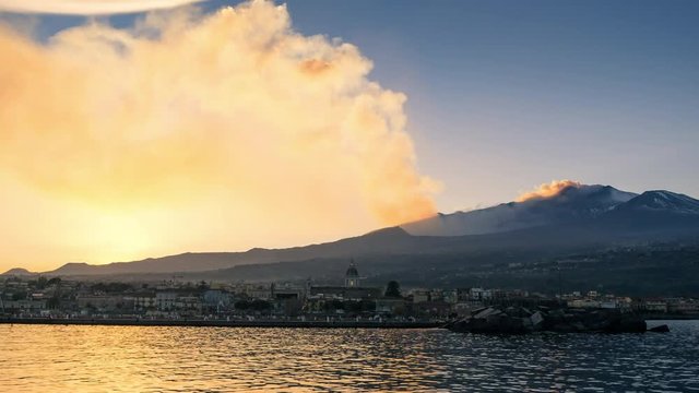 An impressive plume of volcanic ash generated during the eruption of volcano Mt. Etna, december 2018, Catania, Sicily,  Italy