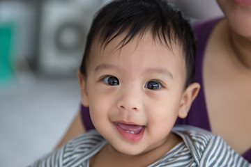 Close up face Baby boy . lovely baby and daddy. family relationship. parents in raising a baby. baby care. image for background, wallpaper, copy space, fashion and article.