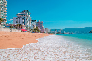 Full shot of hotels located at the edge of the sea in Acapulco.