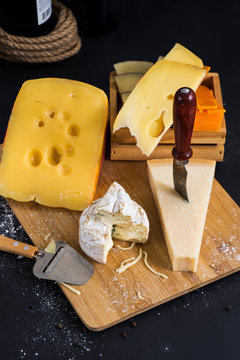 cheese on wooden board