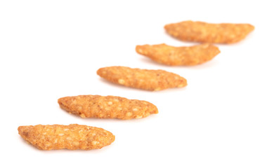Tasty Sesame Sticks on a White Background