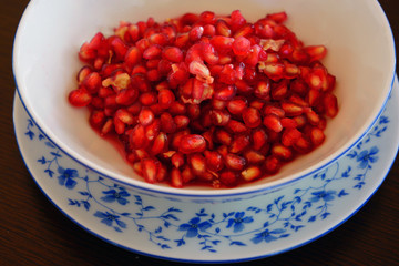 Bowl of freshly open pomegranate seeds