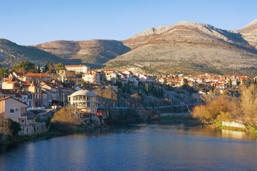 Fototapeta na wymiar Winter view of Trebisnjica river and ancient town of Trebinje. Bosnia and Herzegovina