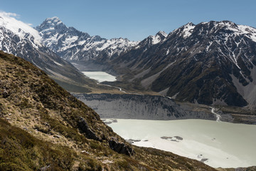View up the Hooker valley to Mount Cook, Mueller Lake in the foreground and Hooker Lake in the background in front of the Hooker Glacier and Mount Cook. Aoraki/Mount Cook National Park, New Zealand.
