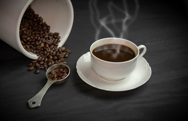 Steaming cup of black coffee