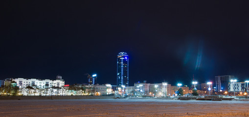 Fototapeta na wymiar 01/04/2019 Yekaterinburg. Russia Evening Yekaterinburg, the view from the embankment of the city pond to the dam, the skyscraper Vysotsky, the house of the merchant Sevastyanov, the residence of the g