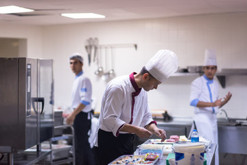 team cooks and chefs preparing meals